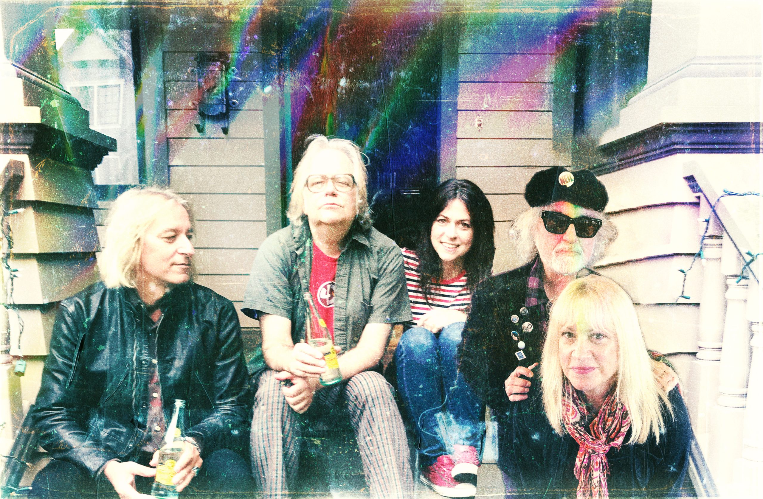 The Minus 5 band with vintage filter sitting on stoop