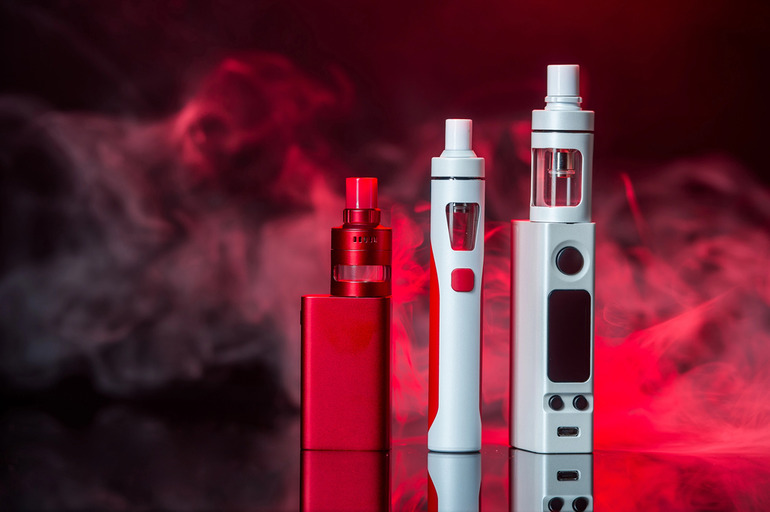 Best THCA vape carts on a black background in smoke