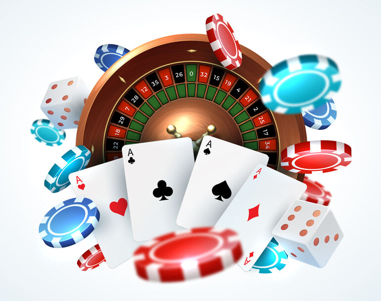 Cards, poker chips, falling dice, and a roulette wheel in an online casino gaming concept