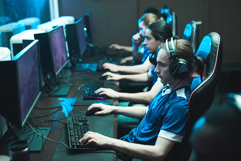 Professional esports team practicing strategy using AI-driven training tools