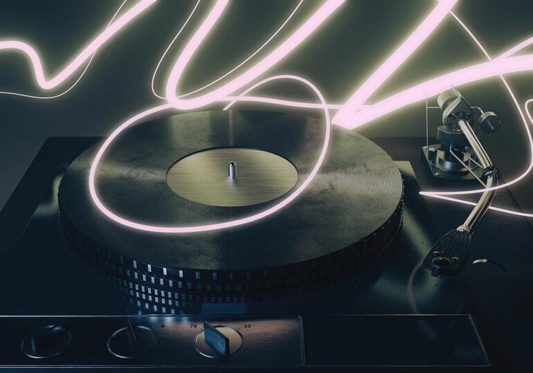 Turntable with glowing light trails symbolizing how digital discovery influences modern music history.