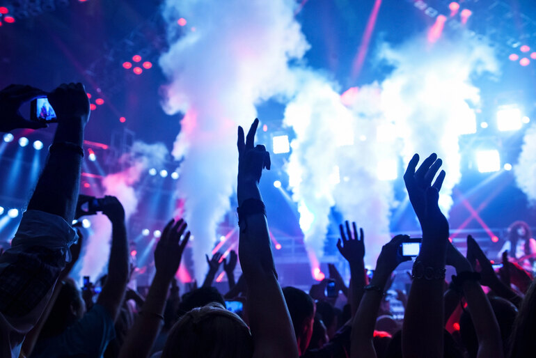 Fans are expecting an encore at a music concert.