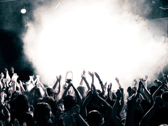 A group of fans is attending a live concert