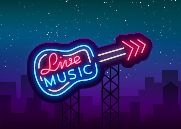 Neon guitar sign representing the rhythm of live music