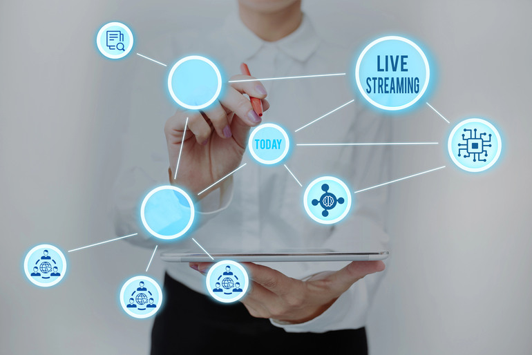 Live streaming technology concept with tablet and real-time digital connections for music and entertainment