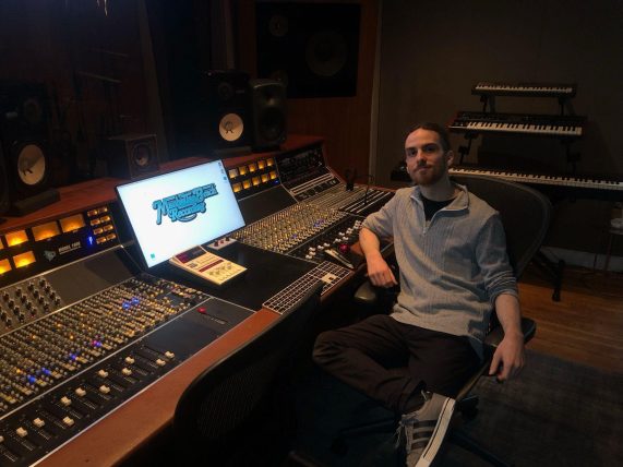 Guénolé Georgelin sitting in a music studio chair