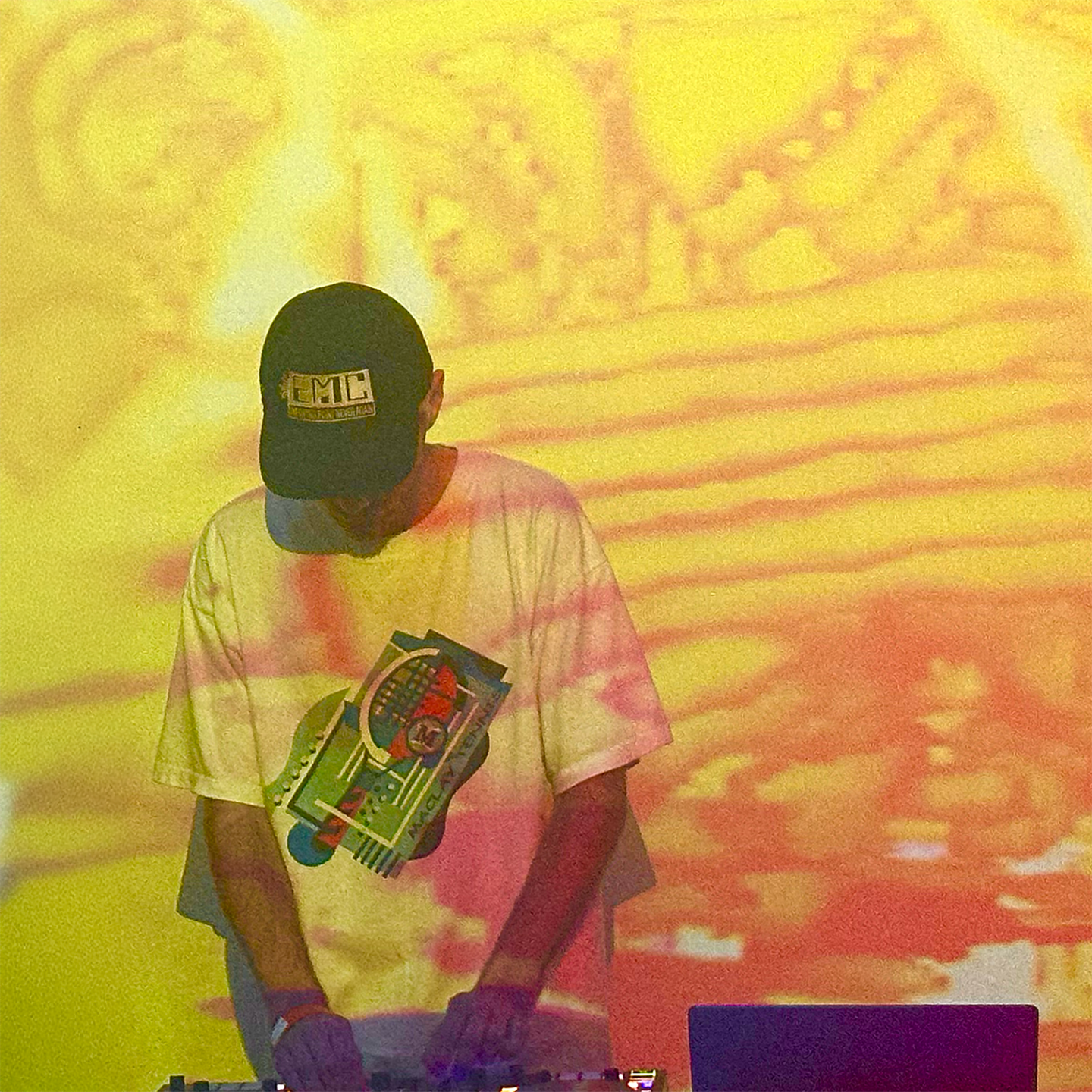 Yob the Delectable at a DJ booth
