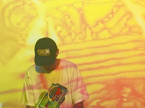 Yob the Delectable at a DJ booth