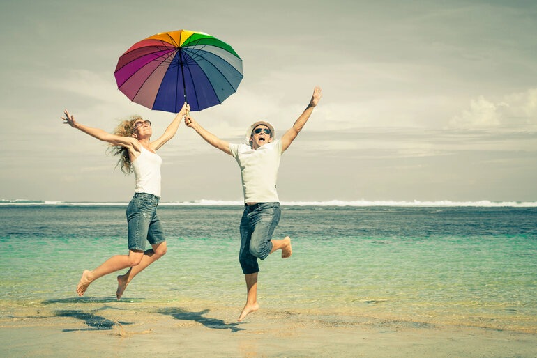 Girl and boy smiling and enjoying a relaxed lifestyle together while spending quality time outdoors.