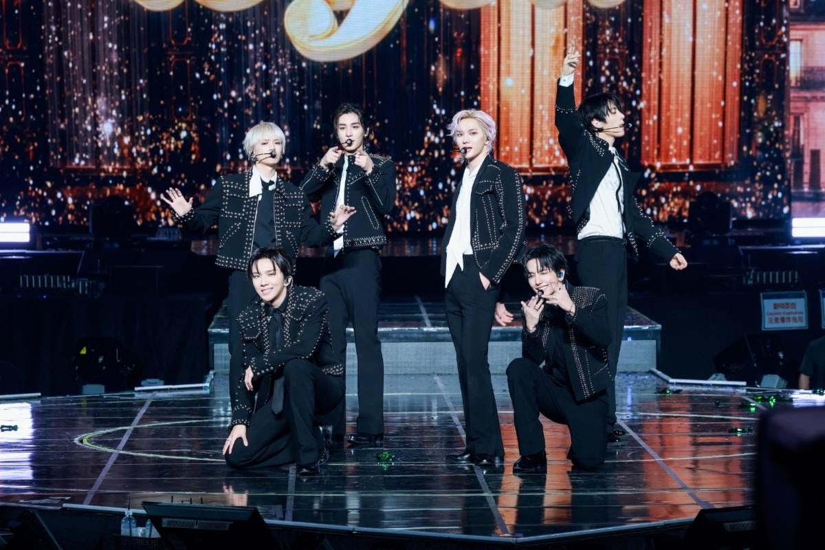 BOYNEXTDOOR performing onstage during a live show.