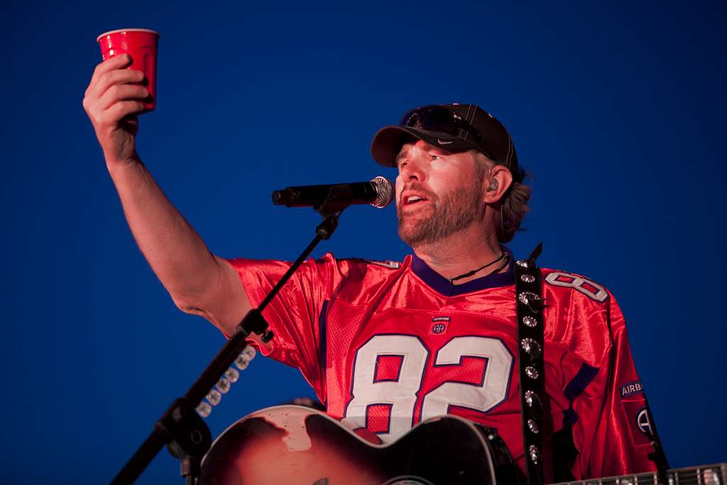 Toby Keith performing with a Red Solo Cup in his hand